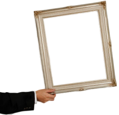 A hand holds an empty picture frame